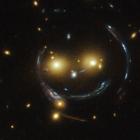 Galaxy cluster with Einstein ring
